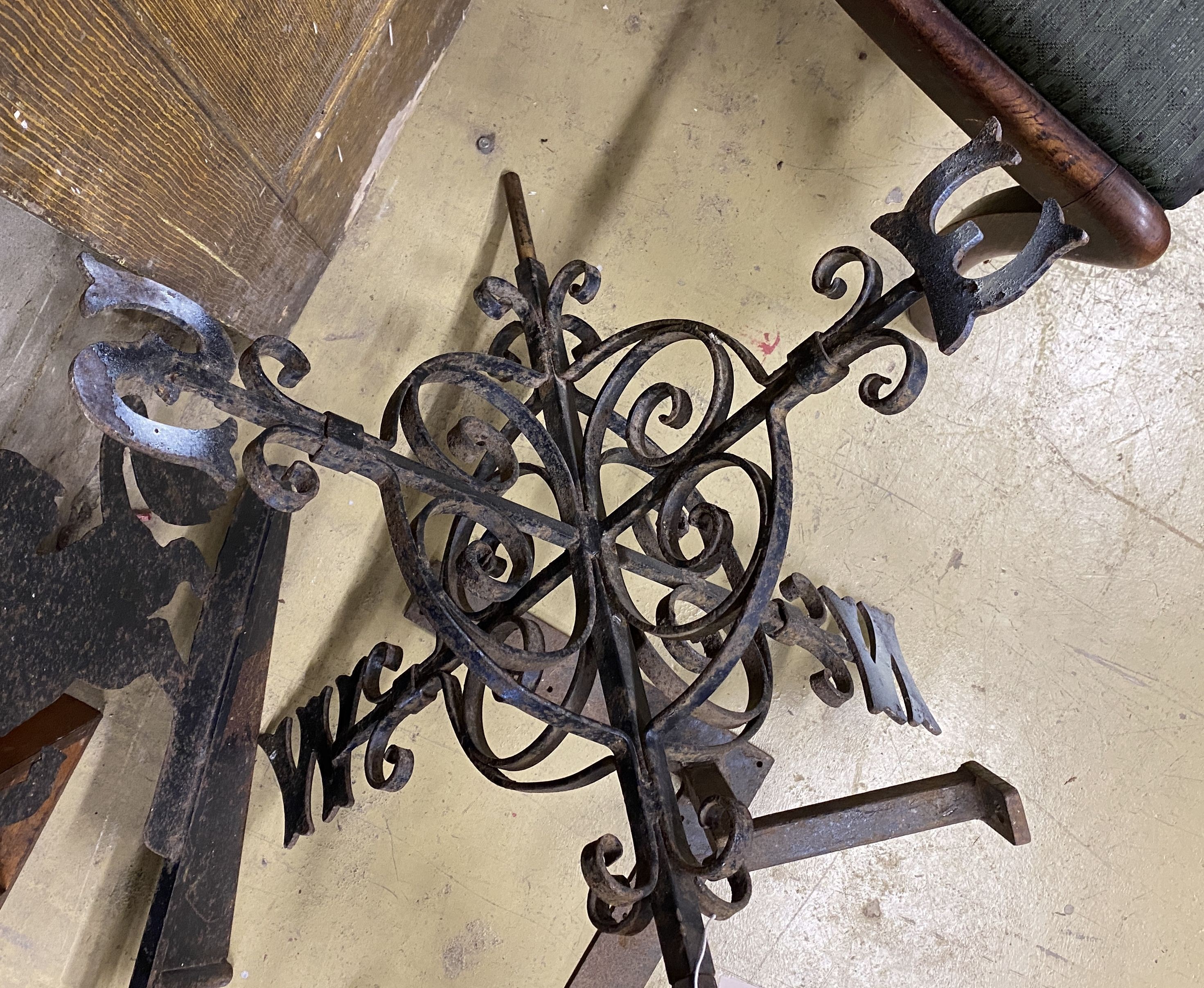 A wrought iron weather vane, width 90cm
